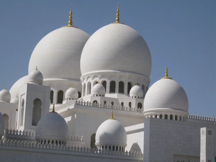 a large white building with domes on top of it, inspired by Sheikh Hamdullah, pixabay, herzog de meuron, immaculate detail, shaded, the three moiras