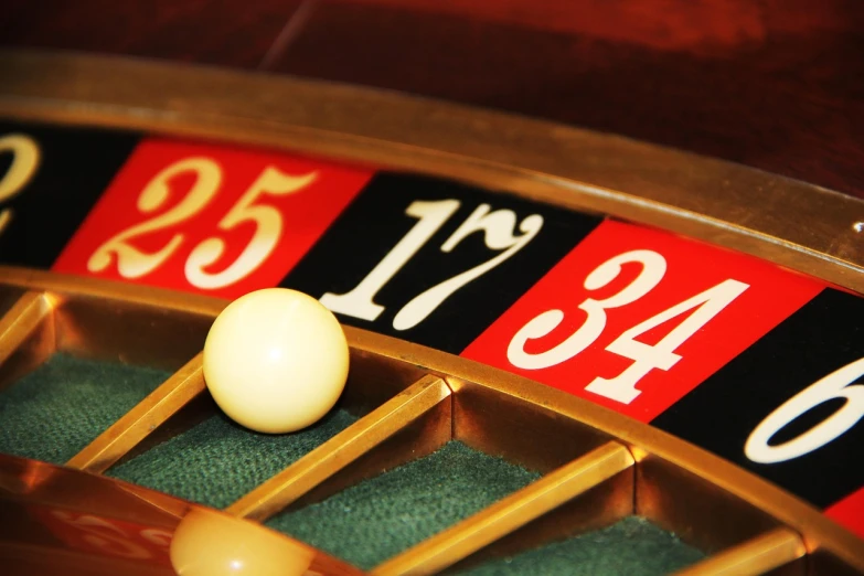 a close up of a casino roule with a ball, unsplash, art nouveau, numerology, wikimedia commons, dial, console