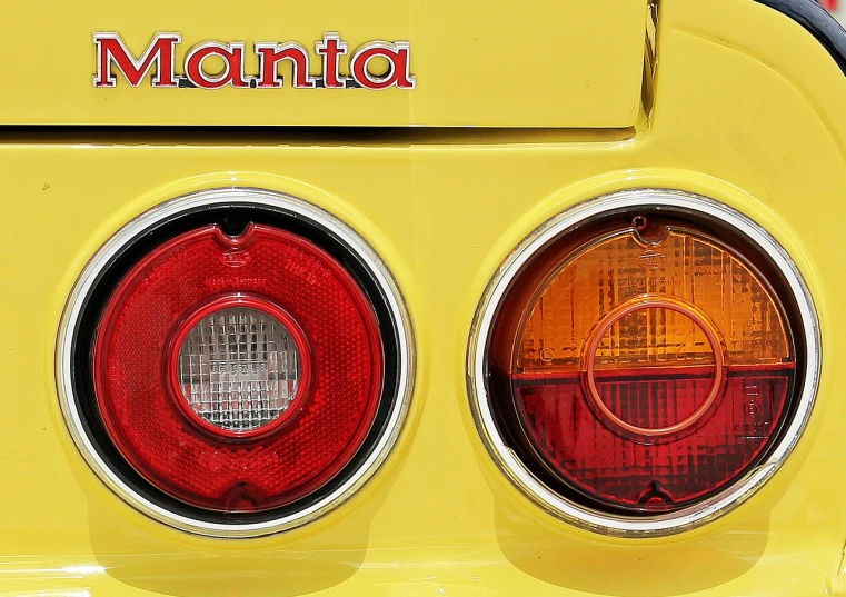 a close up of the tail lights of a yellow bus, by Martin Benka, mantis, remaster, mana, ferrari