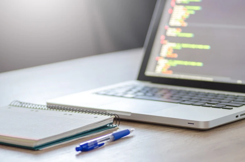 a laptop computer sitting on top of a wooden desk, a picture, figuration libre, beautiful code, technical document, professional closeup photo, background image