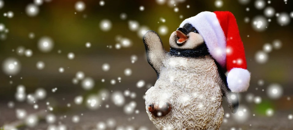 a close up of a toy penguin wearing a santa hat, a photo, by Julia Pishtar, pixabay contest winner, happening, snow on the body, dabbing, shiny soft fur, cute digital art