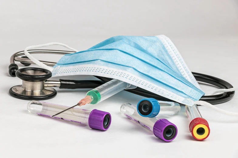 medical equipment including a mask, a stethoscope, and a stethoscope, by Matt Cavotta, shutterstock, plasticien, blood collection vials, close establishing shot, looking across the shoulder, virus