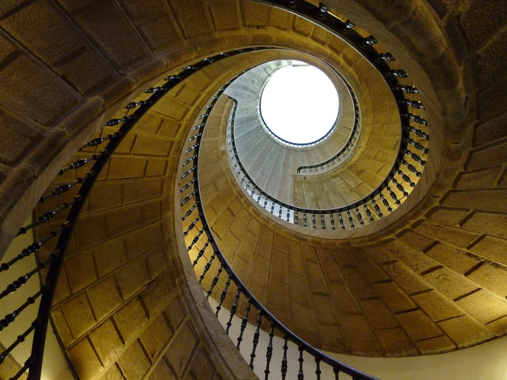 a spiral staircase in a building with a skylight, a picture, pixabay, lisbon, penrose stairs, lighthouse, infinite intricacy