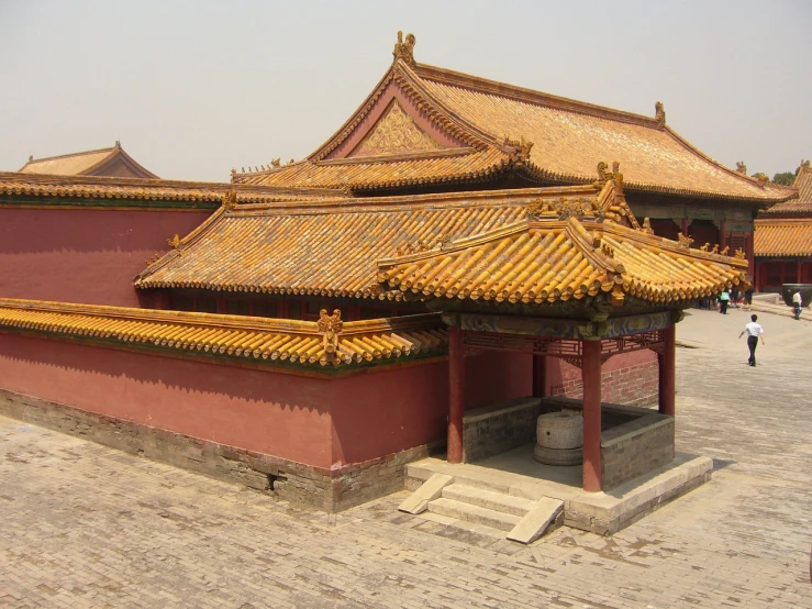 a group of people standing in front of a building, a picture, inspired by Yang Buzhi, flickr, cloisonnism, throne, stone roof, forbidden city, above side view