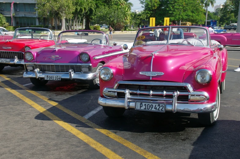 a row of pink classic cars parked in a parking lot, by Pamela Ascherson, flickr, cuban revolution, square, high res, pink and yellow