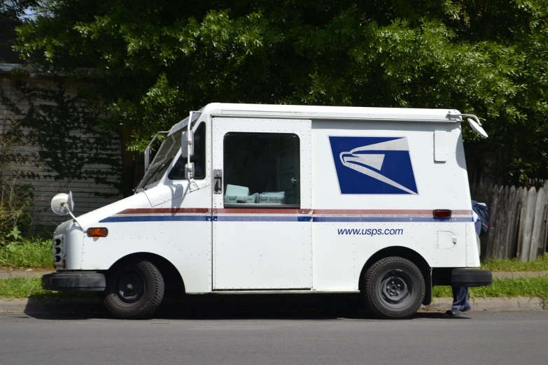 a mail truck parked on the side of the road, a portrait, by Randy Post, shutterstock, full body close-up shot, ebay, washington dc, summer day