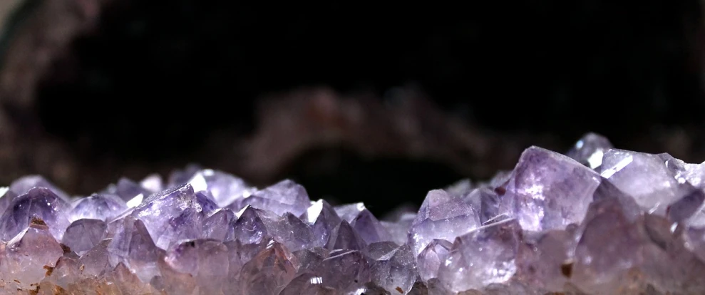 a cluster of purple crystals sitting on top of a rock, a macro photograph, pexels, digital art, onyx bracelets, background image, round-cropped, crystal ruff