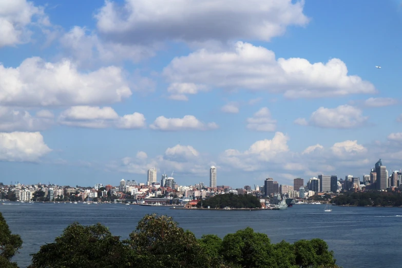 a large body of water with a city in the background, flickr, manly, new york harbour, salvador, wide long view