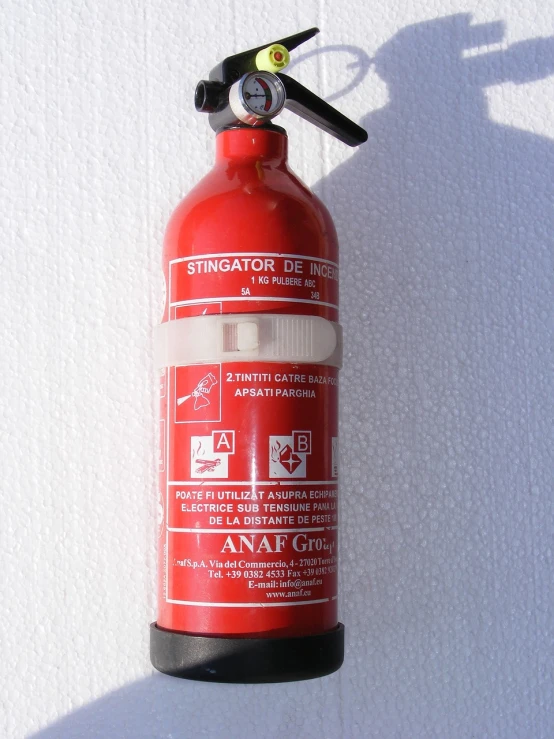 a close up of a fire extinguisor on a wall, by Eva Gonzalès, argos, bottle, 2 1 0 mm, npc