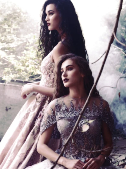 a couple of women sitting next to each other, a portrait, tumblr, fantasy art, haute couture fashion shoot, maya ali as a storm sorcerer, nostalgia for a fairytale, olivia culpo as milady de winter