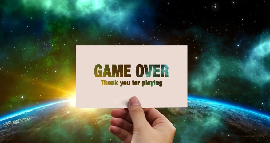 a hand holding a piece of paper that says game over, trending on pixabay, found in space, high quality fantasy stock photo, wonderful masterpiece, front game card