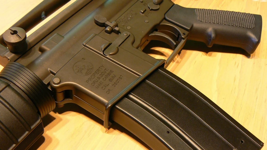 a close up of a gun on a table, by Jason Felix, flickr, cobra, ultra realistic ar 16:9, sleek spines, [ closeup ]!!, panzer