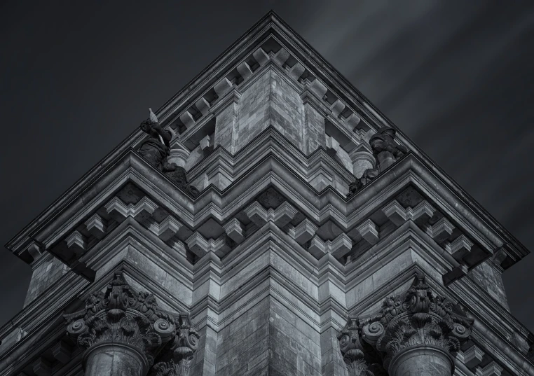 a black and white photo of a tall building, a black and white photo, by Wolfgang Zelmer, baroque, detailed 4 k photo, romanesque style, dramatic closeup composition, during the night