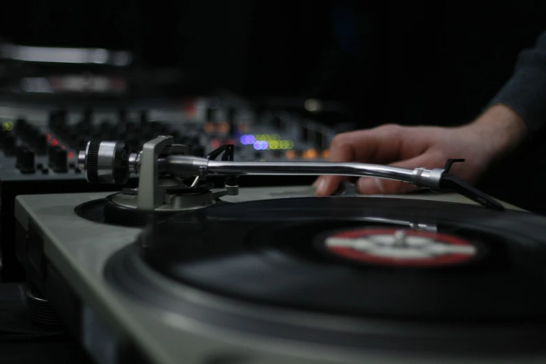 a close up of a person playing a record on a turntable, by Ottó Baditz, b - roll, dj sura, background image, various artists