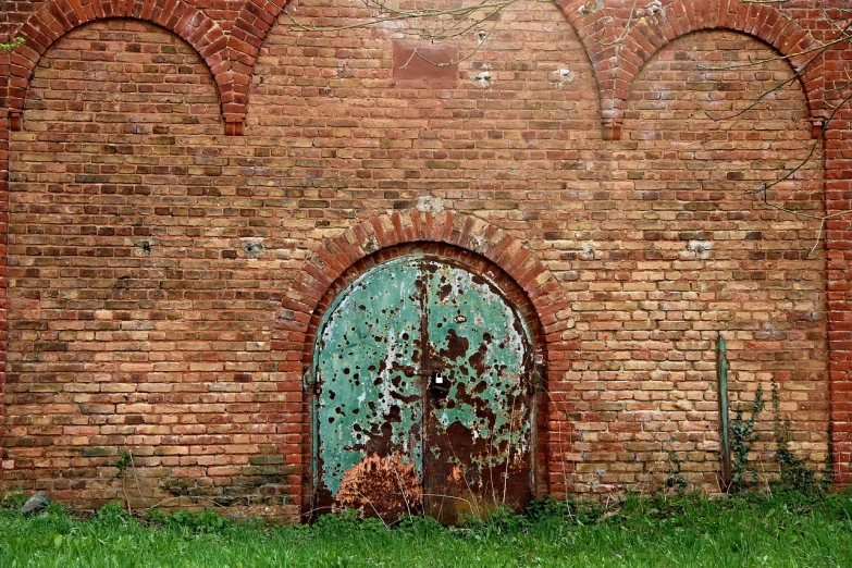 a fire hydrant sitting in front of a brick wall, by Alexander Fedosav, renaissance, iron arc gate door texture, green wall, back arched, flattened