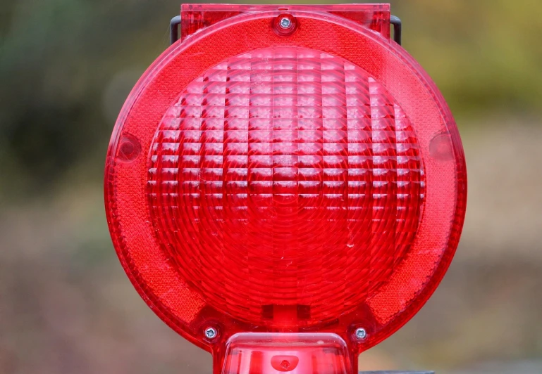 a close up of a red traffic light, by Arnie Swekel, 2 1 0 mm, solar, cp2077, all red