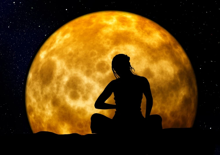 a woman sitting in front of a full moon, by John Moonan, pixabay, sacral chakra, gold, stock photo, yummy