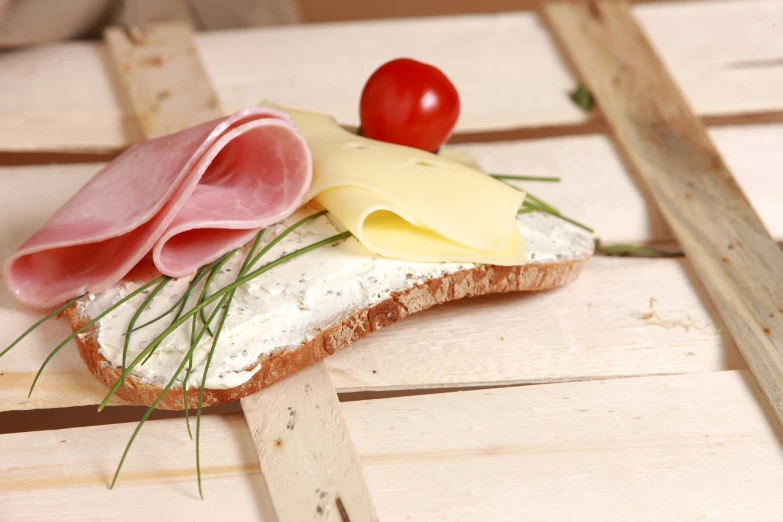 a close up of a sandwich with cheese and ham, a picture, romanticism, product introduction photo, midsummer, voge photo