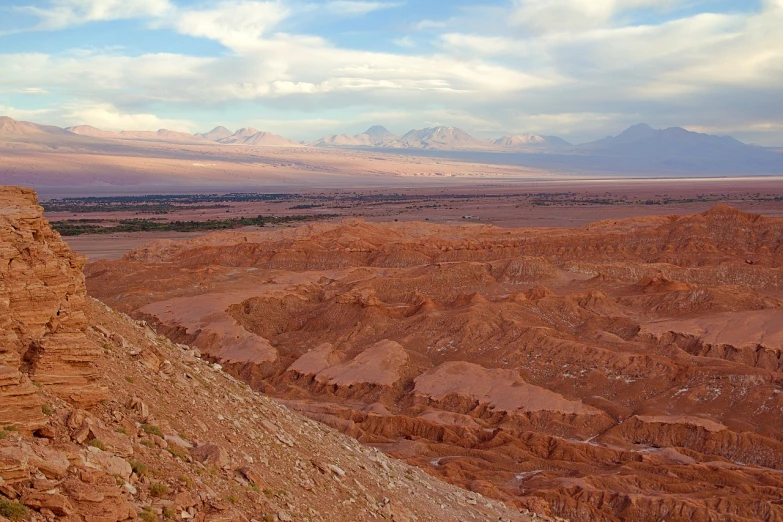 a person riding a horse on top of a mountain, by Andrei Kolkoutine, les nabis, red dusty soil, sunset panorama, lariennechan, huge chasm