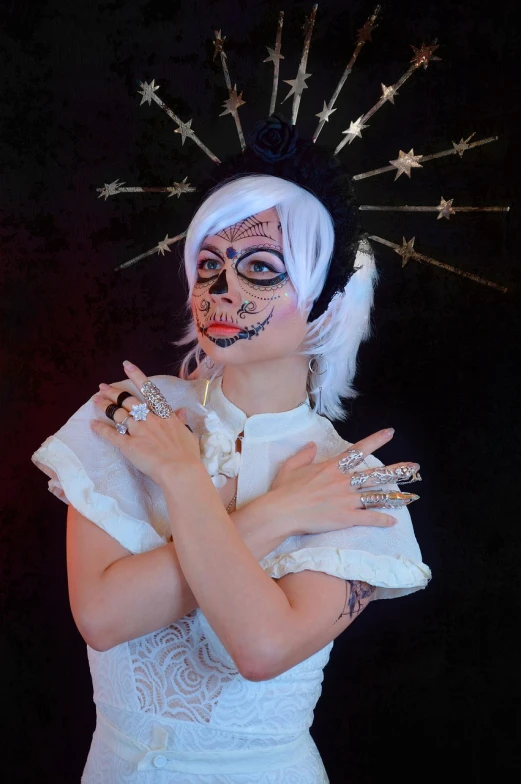 a woman in a white dress posing for a picture, a portrait, inspired by Chica Macnab, body modification, facepaint, stars, loli