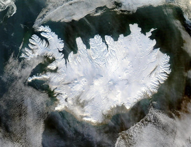 an aerial view of a snow covered mountain, by Þórarinn B. Þorláksson, flickr, hurufiyya, terraformed mars, an island floating in the air, iralki nadar, island