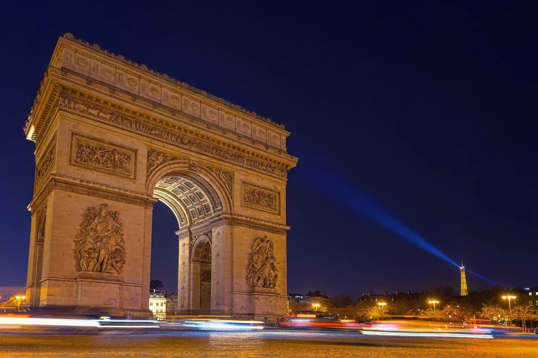 the arc de trio triumph is lit up at night, pexels contest winner, photo of a beautiful, wikimedia commons, archways, straw