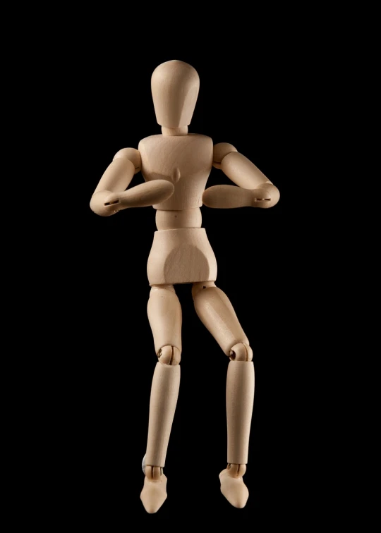a wooden mannequin standing in front of a black background, by Julian Allen, shrugging arms, back view. nuri iyem, action figurine toy, knees upturned