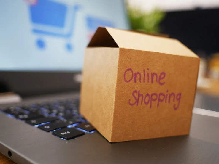 a cardboard box sitting on top of a laptop, by Niko Henrichon, pixabay, modernism, people shopping, ebay listing thumbnail, contain, tag