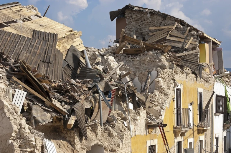 a pile of rubble on the side of a building, a picture, by Matteo Pérez, shutterstock, fracture, rice, nicola samuri, collapsed ceiling