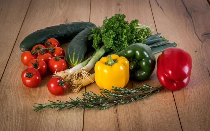 a bunch of vegetables sitting on top of a wooden table, a picture, by Franz Hegi, pixabay, ebay photo, commercial product photography, red green yellow color scheme, close-up product photo