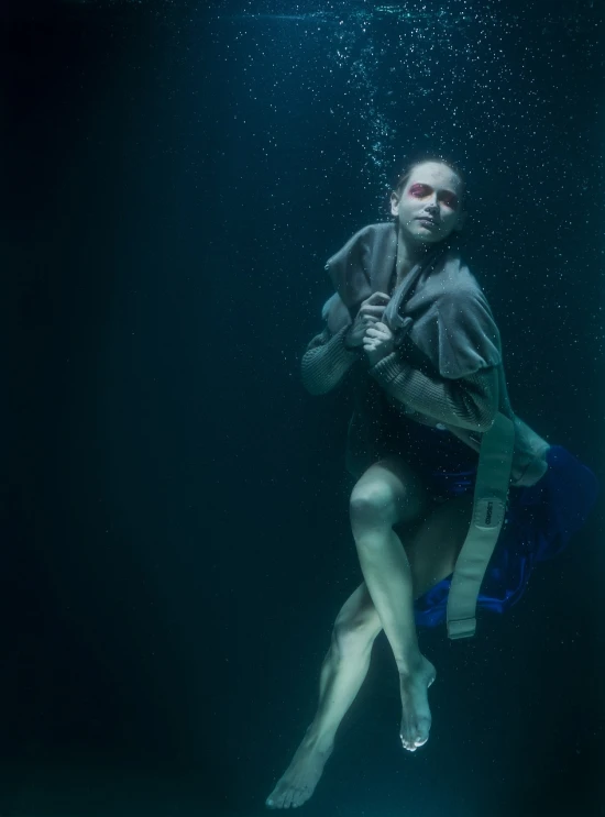 a woman in a bathing suit swims under water, a portrait, by Dietmar Damerau, unsplash, conceptual art, production still, frank dillane as puck, floating robes, behind the scenes