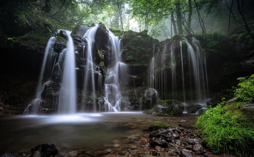 a waterfall in the middle of a lush green forest, a picture, by Etienne Delessert, gentle mists, chiba prefecture, [[fantasy]], black forest