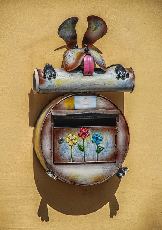 a close up of a mail box on a wall, a photo, street art, flower decorations, closeup photo, bird - eye view, adorable and whimsical