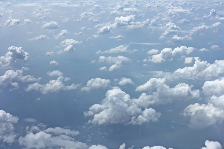 a blue sky filled with lots of white clouds, a picture, by Daniel Taylor, airborne view, overcast skies, loots of clouds, float