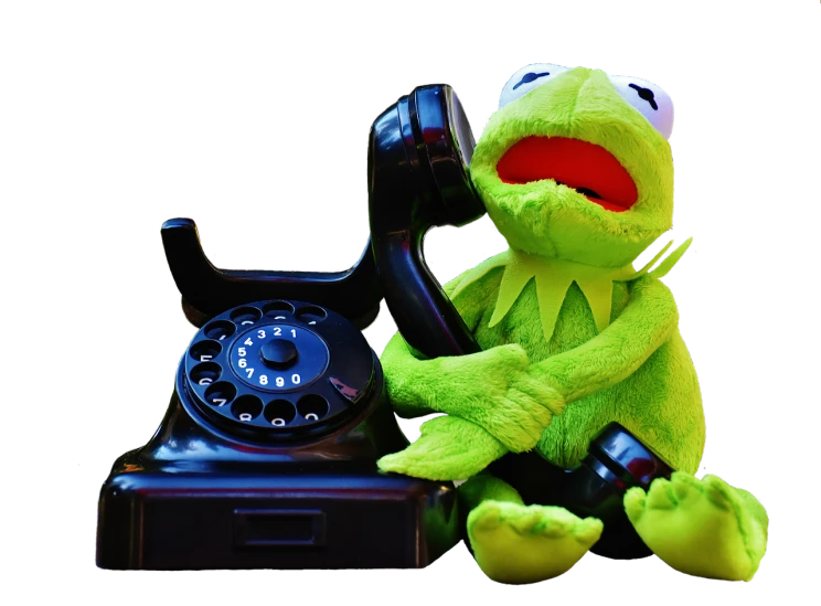 a close up of a stuffed animal on a phone, by Edward Corbett, kermit the frog, telephone, on black background, call now