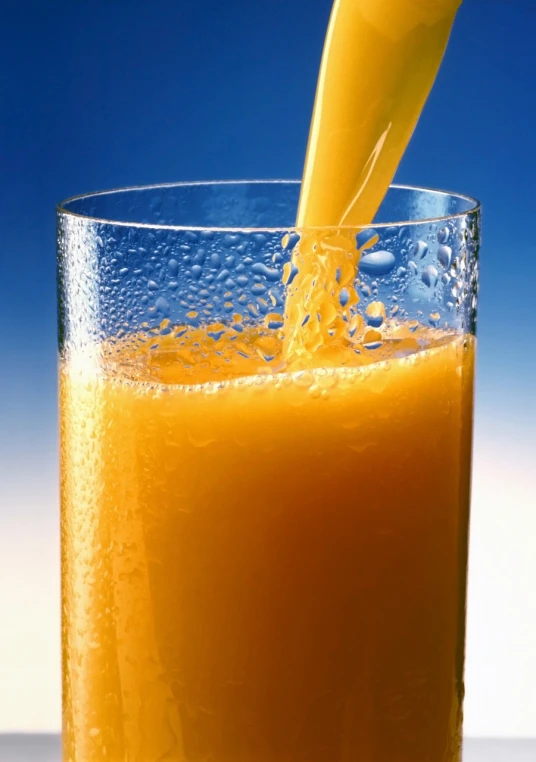 an orange juice being poured into a glass, shutterstock, hurufiyya, photorealism ”, craig miller, profile shot, sun coast