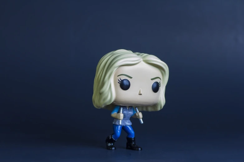 a close up of a toy figure of a woman, inspired by Eve Ryder, pop art, izombie, wide shot photo, funko pop”, productphoto