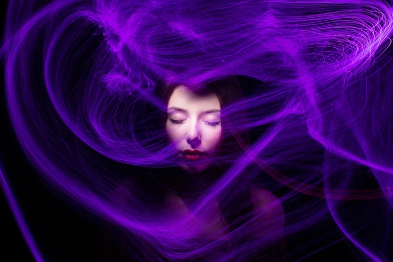 a close up of a person with a purple light, pexels, digital art, electric woman, swirling around, advertising photo, concept portrait