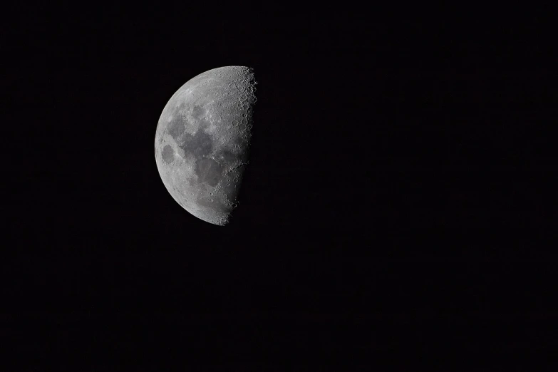 a black and white photo of a half moon, by Hans Schwarz, flickr, night photo, 4 0 0 mm f 1. 8, 2 4 mm iso 8 0 0 color, blog-photo