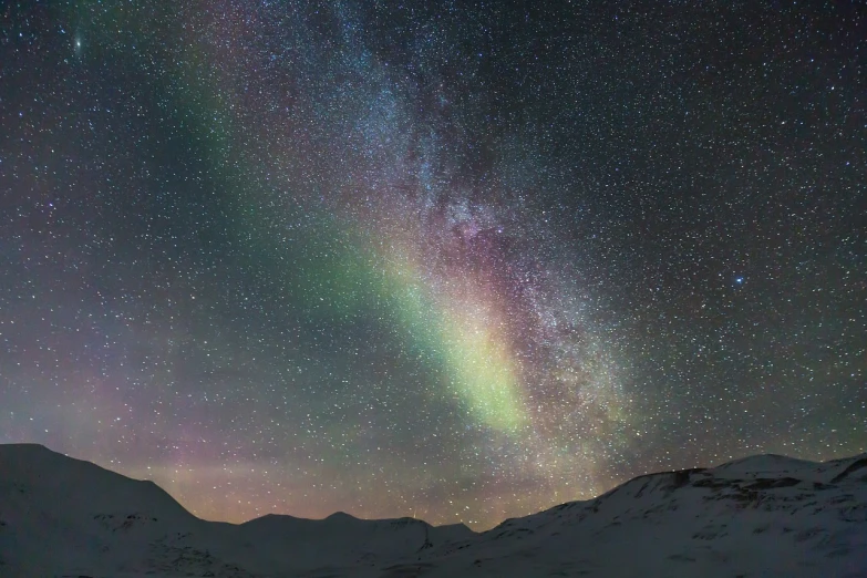a sky filled with lots of stars next to a mountain, by Jørgen Nash, heavenly colors, luminist polar landscape, iridiscent rim light, the milk way up above