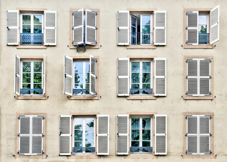 a bunch of windows that are on the side of a building, by Matthias Weischer, shutterstock, shutters, fra, the window is open, très détaillé