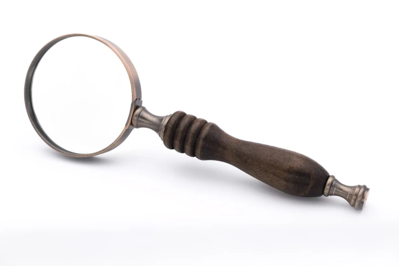a close up of a magnifying glass on a white surface, by Julian Allen, wooden, prop, boken, mirrored