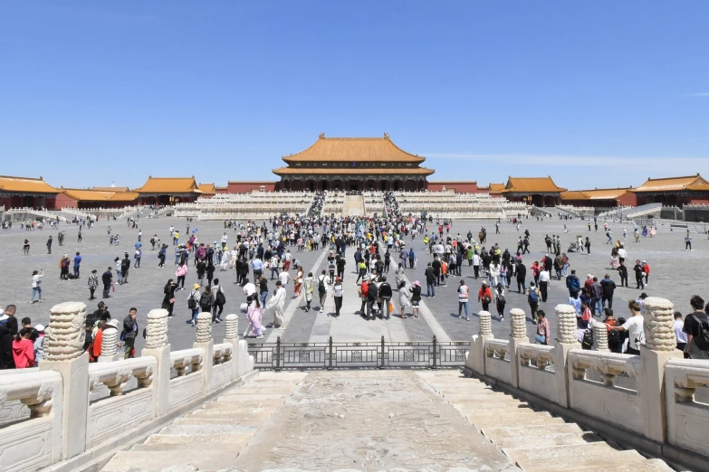 a large group of people standing in front of a building, a picture, by Weiwei, forbidden city, very wide angle view, central hub, 2 0 2 2 photo