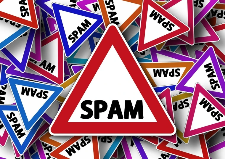 a pile of colorful street signs with the word spam on them, pixabay, postman pat, triangle to use spell, stock photo, chain mail