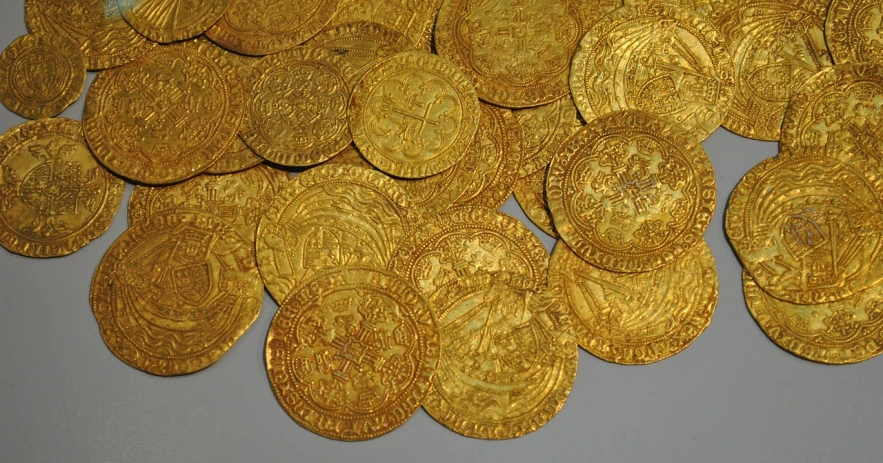 a pile of gold coins sitting on top of a table, by Emanuel Büchel, renaissance, thin gold details, golden thread, aztec, 1500's