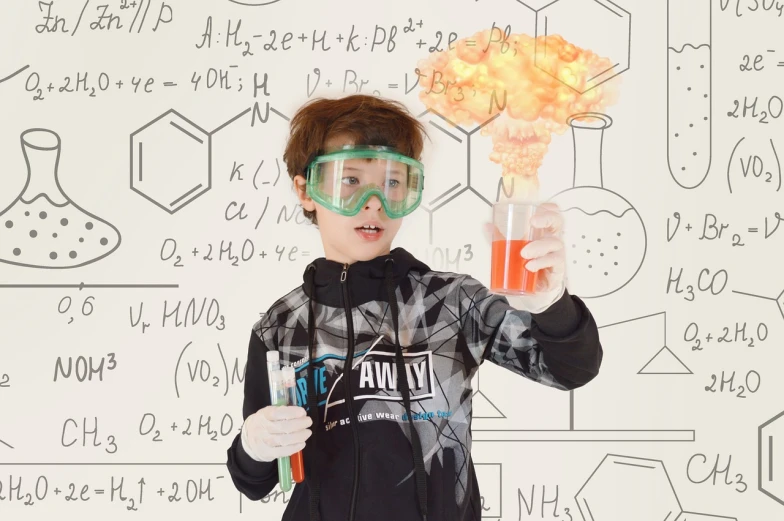 a young boy wearing goggles and holding a flask, a portrait, nuclear art, laboratory background, flaming background, high res photo, blackboard in background