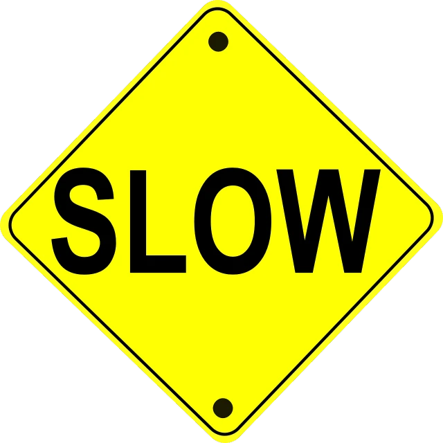 a yellow slow sign on a black background, by Pamela Drew, shutterstock, no gradients, computer - generated, plows, super realistic”