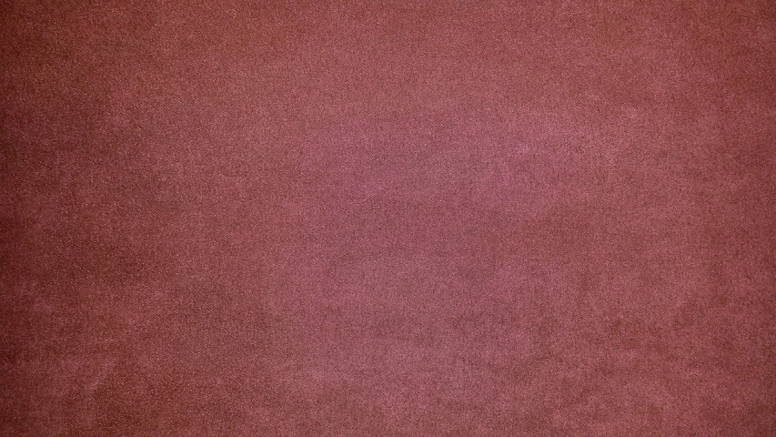 a close up of a red leather surface, a pastel, red carpet photo, mauve background, high detail product photo