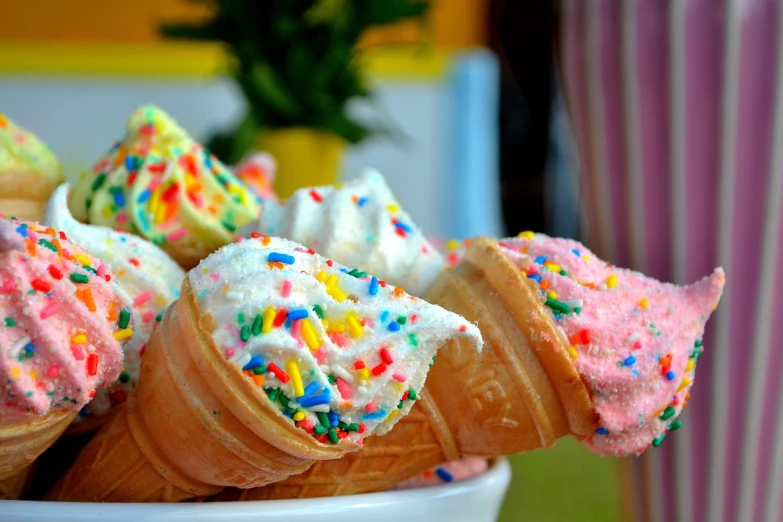a bowl of ice cream cones with sprinkles, by Amelia Peláez, flickr, closeup!!, colorful dream, cornucopia, eating cakes