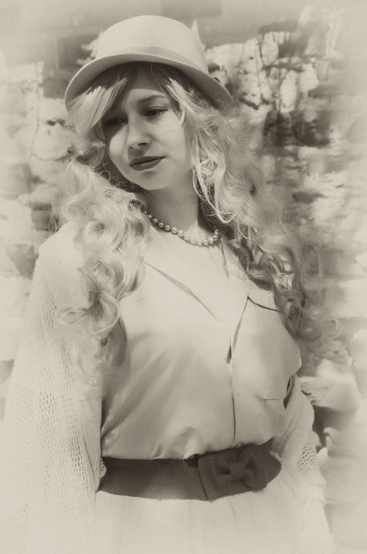 a black and white photo of a woman wearing a hat, a portrait, inspired by Albert Edelfelt, art nouveau, long braided curly blonde hair, cream colored blouse, retro pinup model, clothed in ancient street wear
